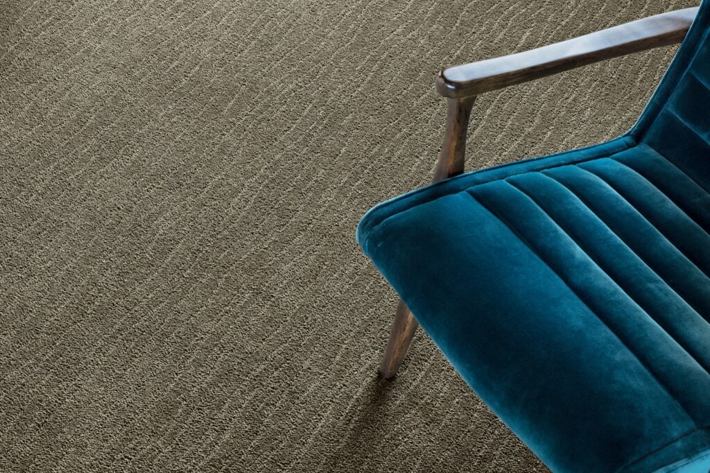 Carpet with Blue Chair | Ultimate Flooring Design Center